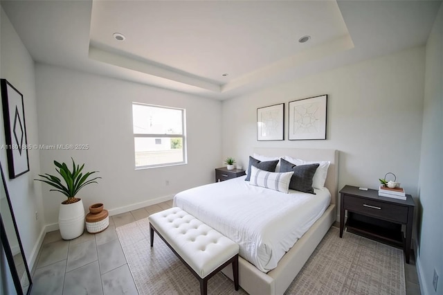 2022 Granada Rd, La Belle, FL 33935 - bedroom with a tray ceiling and baseboards
