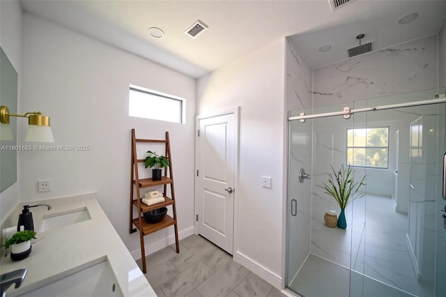 2022 Granada Rd, La Belle, FL 33935 - bathroom featuring marble look tiles, a marble finish shower, and double vanity