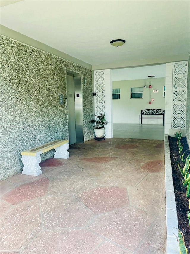 1000 Hillcrest Ct Unit 111, Hollywood, FL 33021 - view of patio featuring elevator