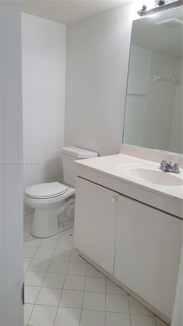 2921 SE 13th Ave Unit 106-48, Homestead, FL 33035 - bathroom featuring toilet, tile patterned floors, and vanity