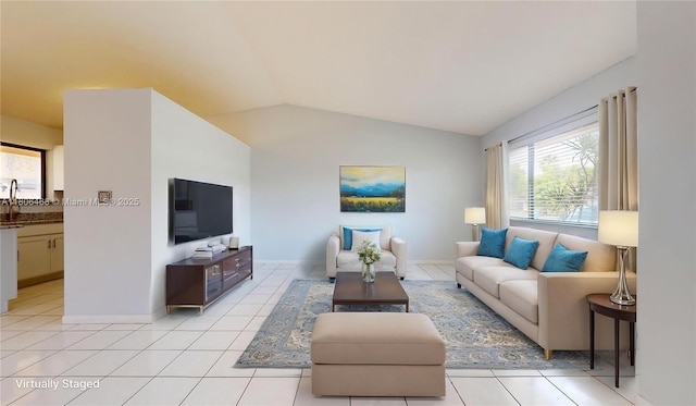 9936 SW 155th St, Miami, FL 33157 - living area featuring lofted ceiling, light tile patterned flooring, and baseboards