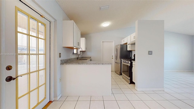 9936 SW 155th St, Miami, FL 33157 - kitchen with stainless steel appliances, white cabinets, and light tile patterned floors