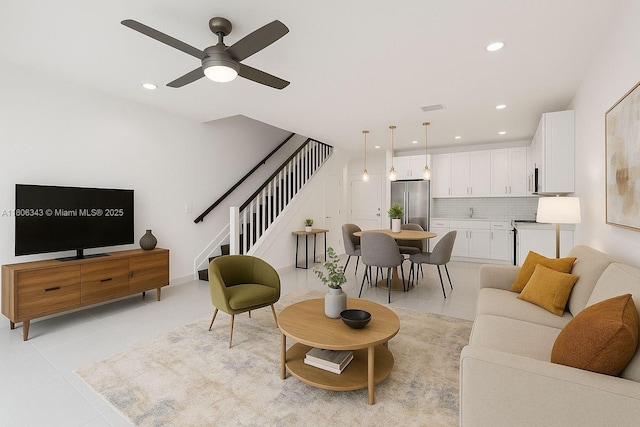 2621 NE 212th Ter Unit 209, Miami, FL 33180 - living room featuring stairway, light tile patterned floors, recessed lighting, and ceiling fan