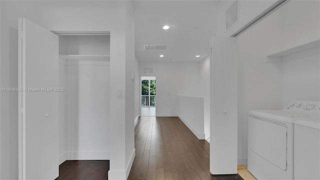 2621 NE 212th Ter Unit 209, Miami, FL 33180 - corridor featuring washer and clothes dryer, recessed lighting, hardwood / wood-style flooring, and baseboards
