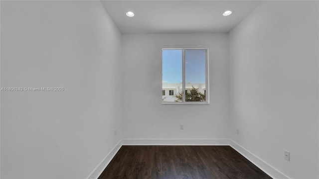 2621 NE 212th Ter Unit 209, Miami, FL 33180 - empty room featuring baseboards, recessed lighting, and dark wood-type flooring