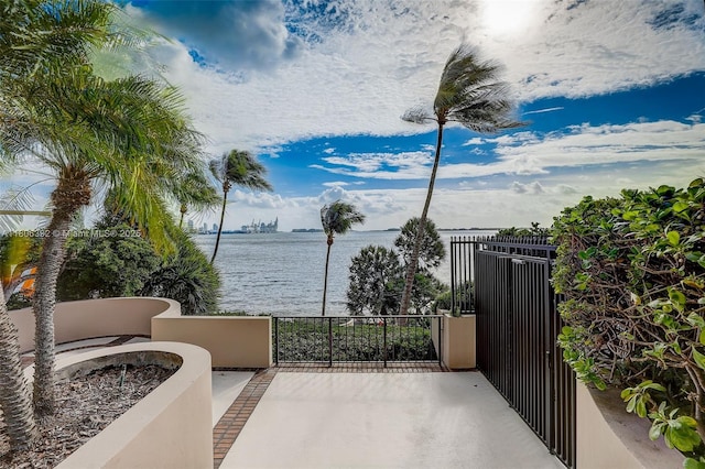 520 Brickell Key Dr Unit A604, Miami, FL 33131 - view of patio / terrace featuring a water view and a balcony