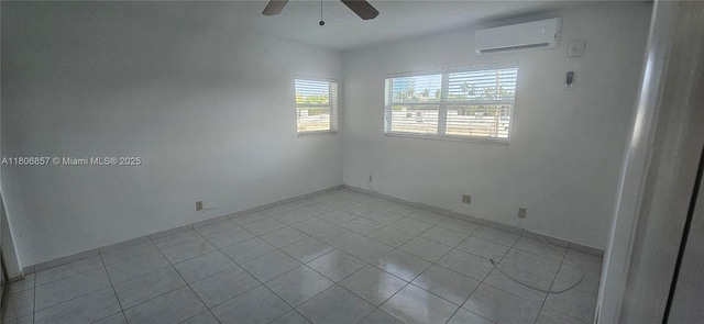 141 NE 10th Ave Unit 22C, Hallandale Beach, FL 33009 - unfurnished room with a wall mounted AC, a ceiling fan, and light tile patterned flooring