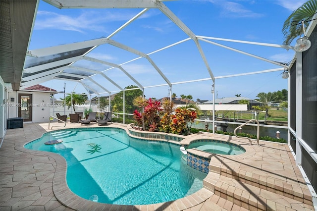 249 SW 37th Ln, Cape Coral, FL 33914 - view of swimming pool with a patio area, a pool with connected hot tub, and glass enclosure