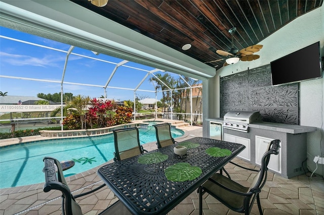 249 SW 37th Ln, Cape Coral, FL 33914 - view of swimming pool with ceiling fan, a patio area, a pool with connected hot tub, and a lanai