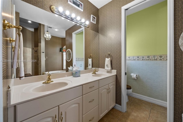 249 SW 37th Ln, Cape Coral, FL 33914 - full bathroom with toilet, double vanity, tile patterned flooring, and tiled shower