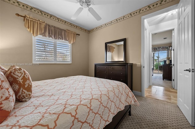 249 SW 37th Ln, Cape Coral, FL 33914 - bedroom featuring carpet floors, ceiling fan, and baseboards
