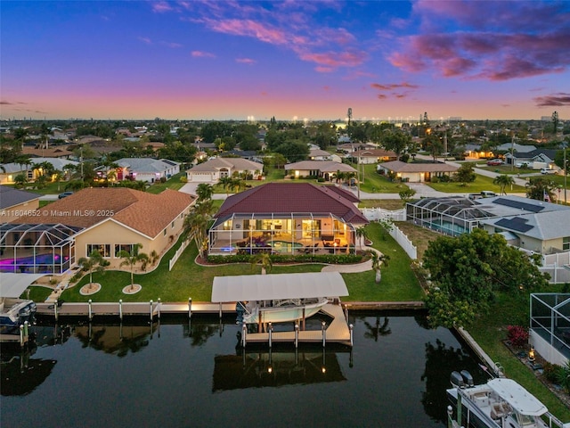 249 SW 37th Ln, Cape Coral, FL 33914 - aerial view at dusk of a water view and a residential view