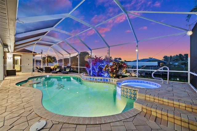 249 SW 37th Ln, Cape Coral, FL 33914 - view of swimming pool with a patio area, a pool with connected hot tub, a lanai, and outdoor lounge area