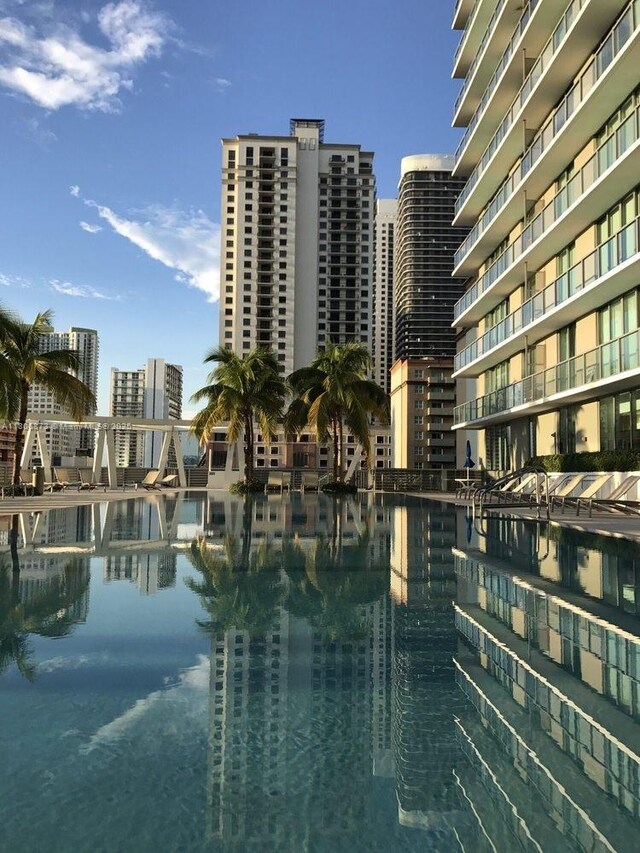 1111 SW 1st Ave Unit 2217-N, Miami, FL 33130 - view of pool featuring a water view and a city view