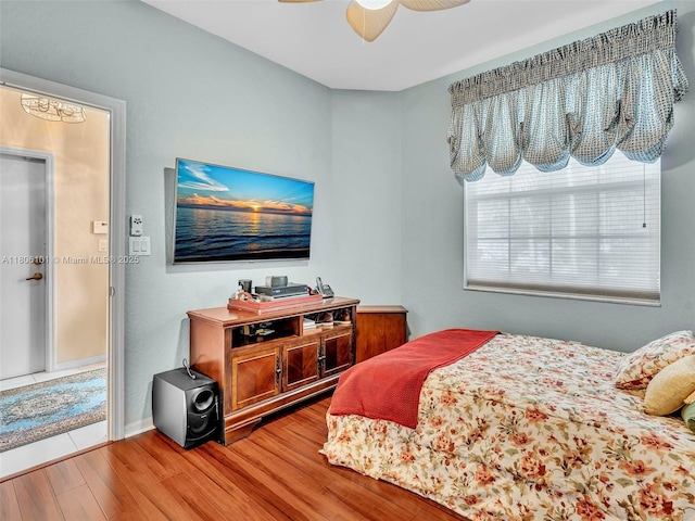 2530 E Aragon Blvd Unit 1, Sunrise, FL 33313 - bedroom with wood finished floors and ceiling fan