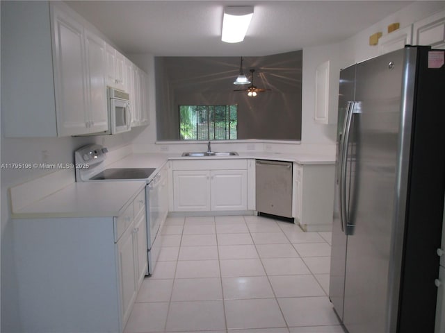 4112 Pine Ridge Ln, Weston, FL 33331 - kitchen featuring appliances with stainless steel finishes, light countertops, ceiling fan, white cabinetry, and light tile patterned flooring