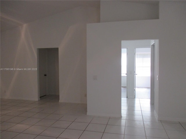 4112 Pine Ridge Ln, Weston, FL 33331 - empty room with light tile patterned floors and baseboards
