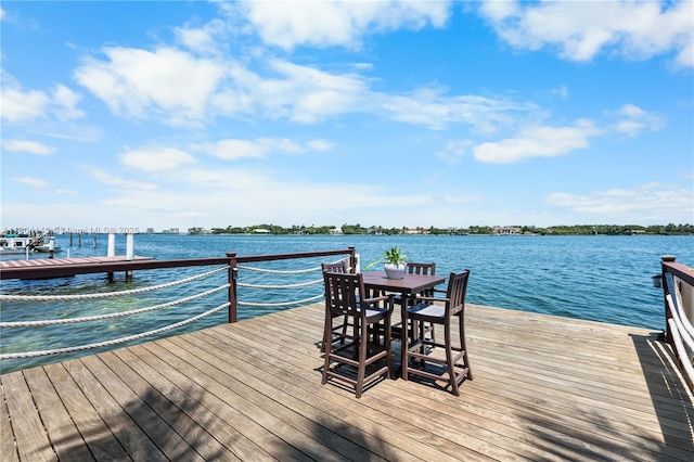 1241 Stillwater Dr, Miami Beach, FL 33141 - dock area with a water view and outdoor dining area
