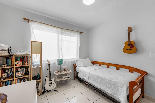 1241 Stillwater Dr, Miami Beach, FL 33141 - bedroom with tile patterned flooring