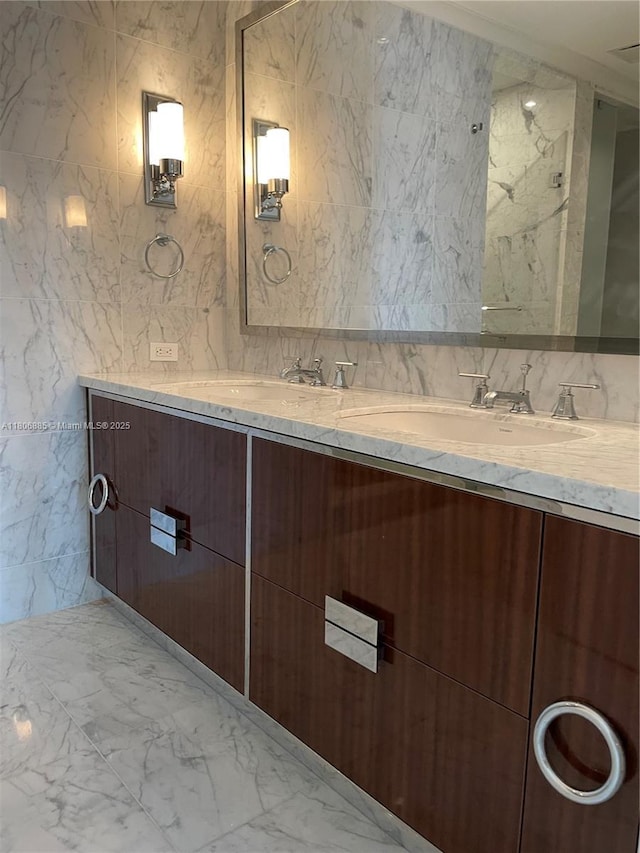 15701 Collins Ave Unit 1603, Sunny Isles Beach, FL 33160 - full bath with marble finish floors, tile walls, and double vanity