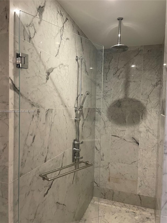 15701 Collins Ave Unit 1603, Sunny Isles Beach, FL 33160 - bathroom featuring a marble finish shower