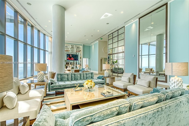15701 Collins Ave Unit 1603, Sunny Isles Beach, FL 33160 - living room featuring healthy amount of natural light, recessed lighting, and a towering ceiling