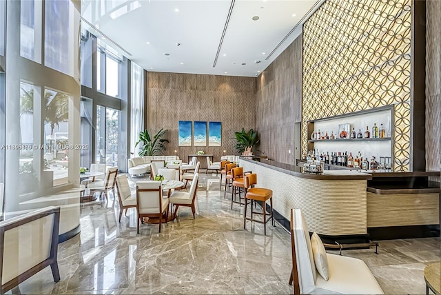 15701 Collins Ave Unit 1603, Sunny Isles Beach, FL 33160 - indoor dry bar with a high ceiling, recessed lighting, and marble tiled flooring