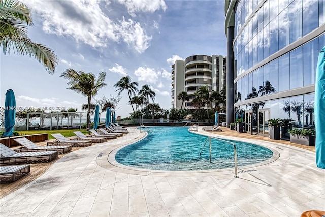 15701 Collins Ave Unit 1603, Sunny Isles Beach, FL 33160 - community pool with a patio area