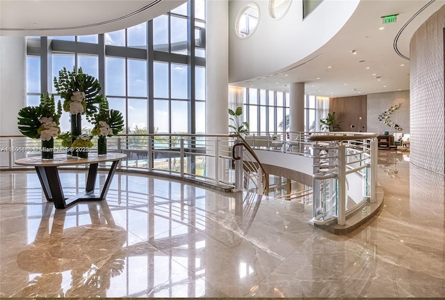 15701 Collins Ave Unit 1603, Sunny Isles Beach, FL 33160 - common area with a high ceiling and expansive windows