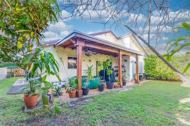 14226 SW 90th Ter, Miami, FL 33186 - view of yard with ceiling fan and a patio