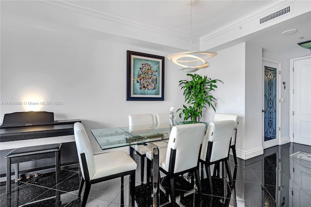 848 Brickell Key Dr Unit 3803, Miami, FL 33131 - dining area with granite tiled floors, baseboards, and crown molding