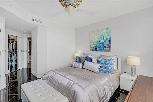 848 Brickell Key Dr Unit 3803, Miami, FL 33131 - bedroom with granite tiled floors, crown molding, a closet, and baseboards