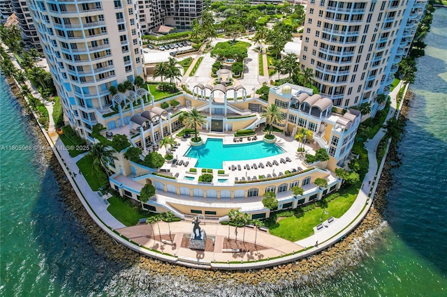 848 Brickell Key Dr Unit 3803, Miami, FL 33131 - bird's eye view of a pool, apartment complex, and a large body of water