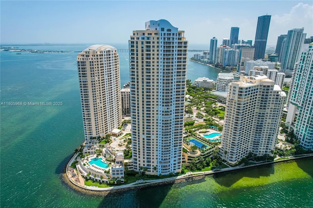 848 Brickell Key Dr Unit 3803, Miami, FL 33131 - bird's eye view of a pool area, a large body of water, and city skyline