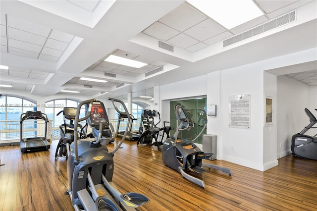 848 Brickell Key Dr Unit 3803, Miami, FL 33131 - exercise room featuring hardwood / wood-style flooring and baseboards