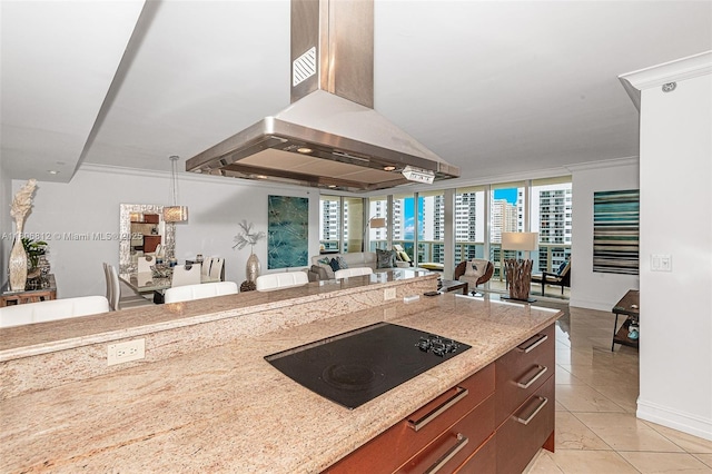 1850 S Ocean Dr Unit 1105, Hallandale Beach, FL 33009 - kitchen with island range hood, black electric cooktop, open floor plan, light tile patterned floors, and plenty of natural light