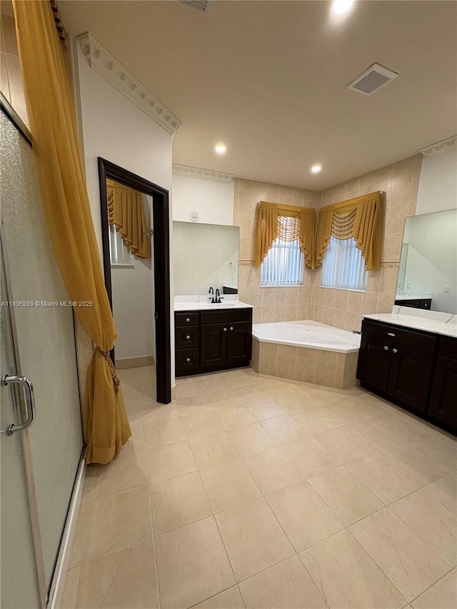 15375 SW 93rd Ln, Miami, FL 33196 - full bath featuring a bath, two vanities, a shower stall, tile patterned floors, and recessed lighting