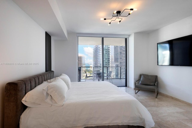 88 SW 7th St Unit 2707, Miami, FL 33130 - bedroom featuring a wall of windows