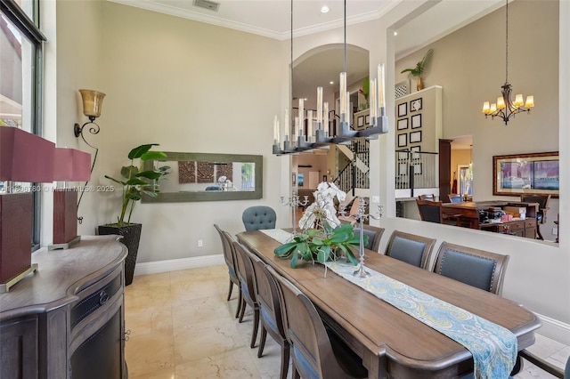 11898 SW 74th Ter, Miami, FL 33183 - dining space featuring a chandelier, ornamental molding, marble finish flooring, baseboards, and a high ceiling