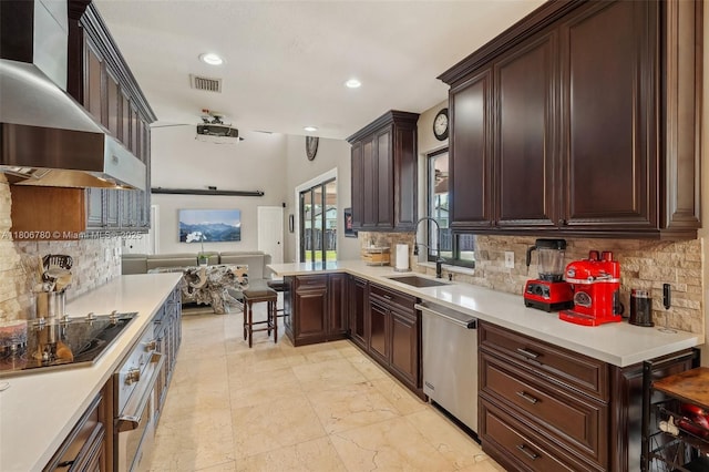 11898 SW 74th Ter, Miami, FL 33183 - kitchen with a sink, stainless steel appliances, light countertops, tasteful backsplash, and recessed lighting