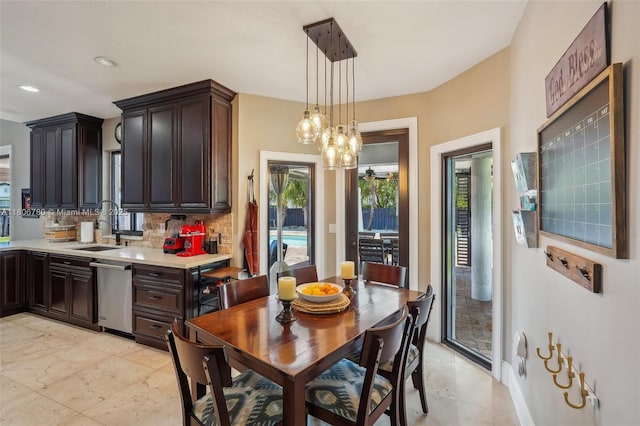 11898 SW 74th Ter, Miami, FL 33183 - dining room featuring a chandelier