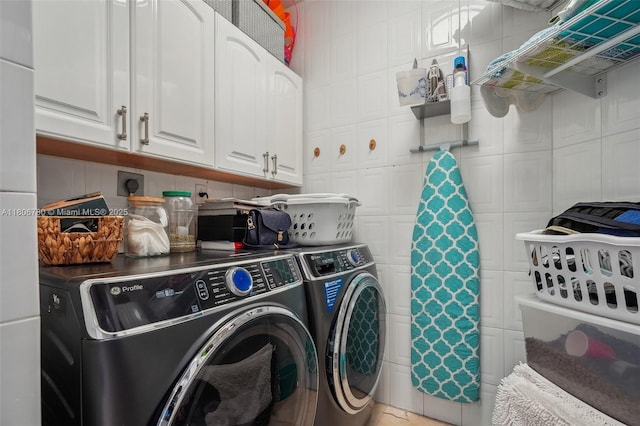 11898 SW 74th Ter, Miami, FL 33183 - laundry room featuring washing machine and clothes dryer and cabinet space
