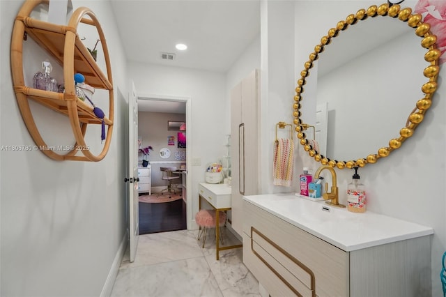 11898 SW 74th Ter, Miami, FL 33183 - bathroom with marble look tiles, vanity, baseboards, and recessed lighting