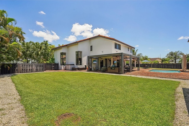 11898 SW 74th Ter, Miami, FL 33183 - back of house featuring a patio area and stucco siding