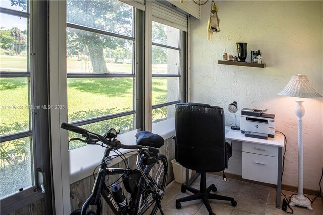 4501 Martinique Way # C1, Coconut Creek, FL 33066 - office featuring a textured wall, light tile patterned floors, and baseboards