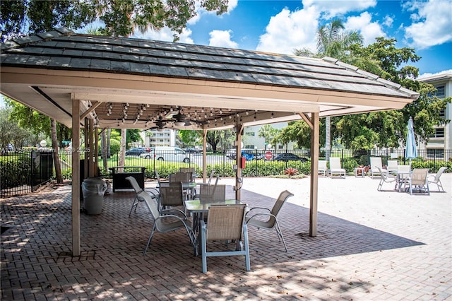 4501 Martinique Way # C1, Coconut Creek, FL 33066 - view of property's community featuring a gazebo, outdoor dining area, and a patio