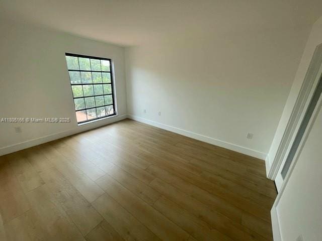 5570 NW 44th St Unit 209A, Lauderhill, FL 33319 - unfurnished room featuring wood finished floors