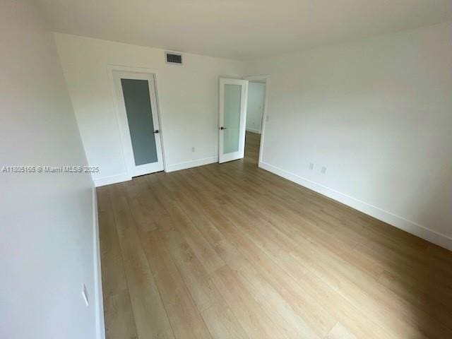 5570 NW 44th St Unit 209A, Lauderhill, FL 33319 - empty room with wood finished floors