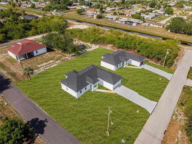 2506 5th St SW, Lehigh Acres, FL 33976 - aerial perspective of suburban area with a large body of water
