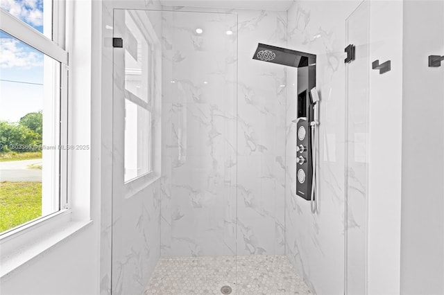 2506 5th St SW, Lehigh Acres, FL 33976 - full bathroom featuring a marble finish shower